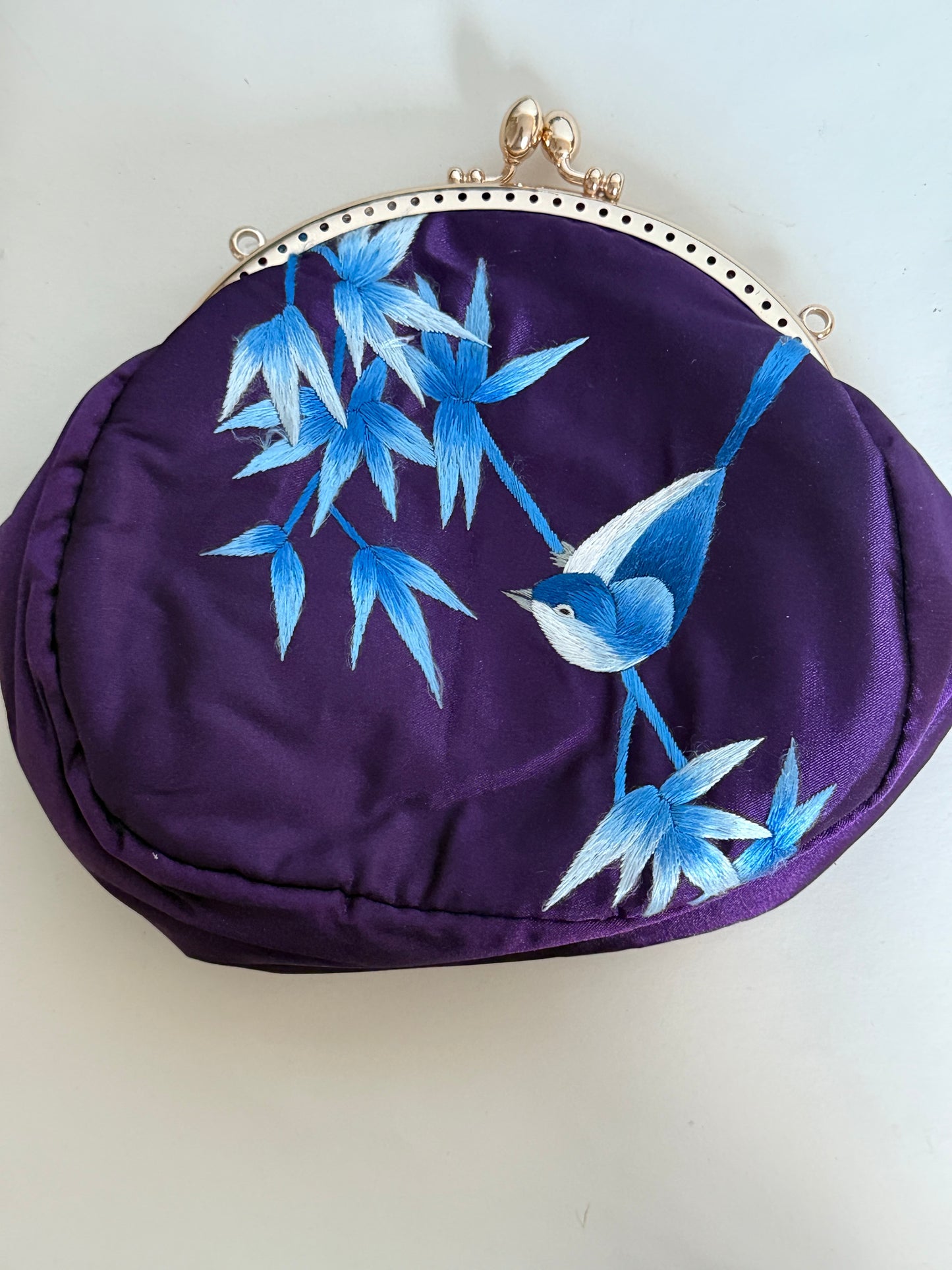 Handmade Embroidered Clutch from Luliang, Yunnan – A Timeless Heritage