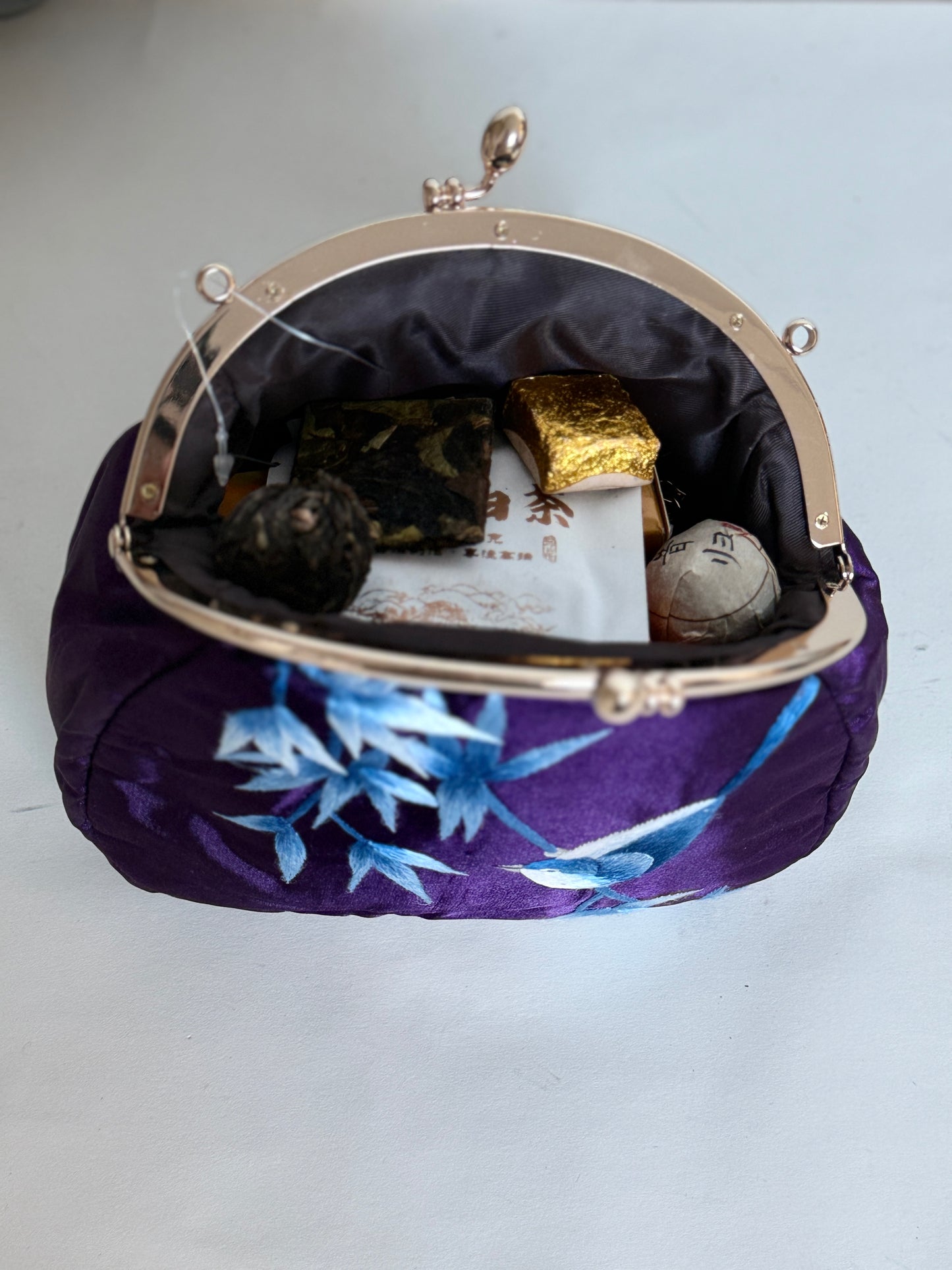 Handmade Embroidered Clutch from Luliang, Yunnan – A Timeless Heritage