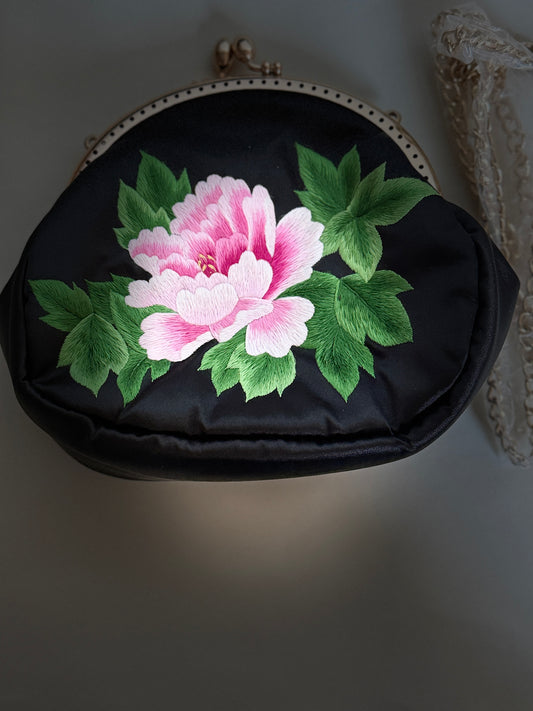 Handmade Embroidered Clutch from Luliang, Yunnan – A Timeless Heritage